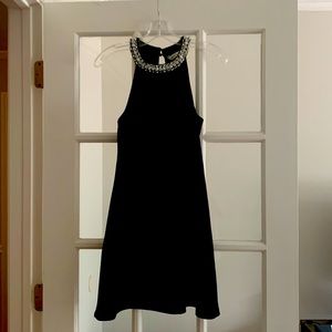 Gently Used Medium Black Cocktail Dress with beaded neckline